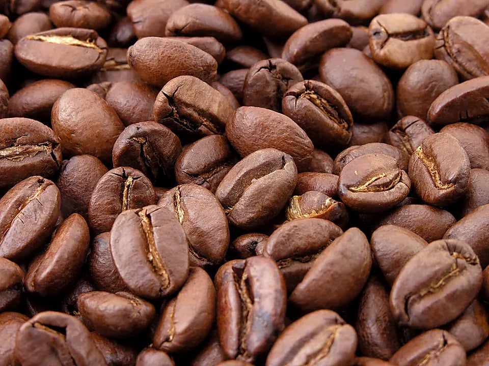 Roasted coffee beans representing coffee pouch flavor